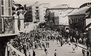 Israel Prints: Jerusalem girls on balcony look down on riots on the street below on 1939 May 27