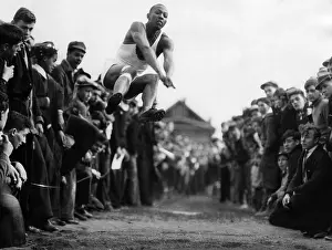 Owens Prints: Jesse Owens (1913-1980), American athlete and winner of four gold medals in the 1936 Summer Olympics