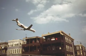 Airlines Prints: Jet Liner coming in for landing at Logan Airport in East Boston. June 1973