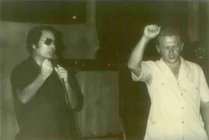 Communes Prints: Jim Jones with a guest in Jonestown with visitors that accompanied Congressman Leo Ryan to Jonestown