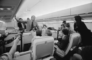 August Prints: Jimmy Carter holding an informal press conference aboard his plane on a campaign trip