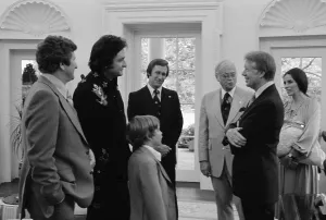 August Prints: Jimmy Carter with Johnny Cash and his family in the Oval Office. Ca. 1977-1980