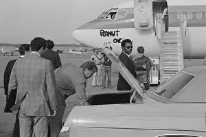 Luggage Prints: Jimmy Carter retrieving his luggage from a car before boarding Peanut One campaign airplane