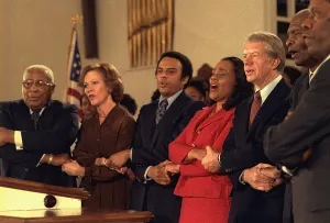 Coretta Prints: Jimmy Carter and Rosalynn Carter sing with Martin Luther King Sr