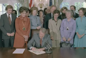 August Prints: Jimmy Carter signs a House of Representatives Resolution to extend the deadline for state ratification of the for Equal