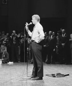 Brooklyn Prints: Jimmy Carter speaking in shirt sleeves at a Brooklyn College campaign stop in New York