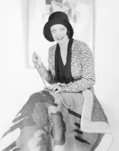 1930s Fashion Prints: Joan Crawford doing needlepoint, 1932