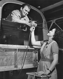 Manufacturing Prints: Joe Cobb, former fat boy in the original Our Gang comedies, building B-25 bombers