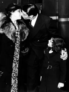 Kiss Prints: Joe DiMaggio with his mother and niece, 1937. Courtesy: CSU Archives/Everett Collection
