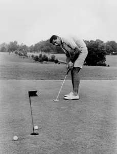 Football Players Prints: Joe Namath playing golf at the University of Alabama in Tuscaloosa. 1966