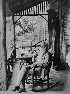 Table Prints: John Burroughs in a rocking chair on the porch of Woodchuck Lodge in 1913