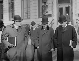 Overcoat Prints: John D. Rockefeller and others walking from a New York Court House