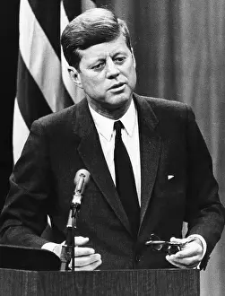 Speaking Prints: John F. Kennedy, admits the possibility of passing a tax bill at a news conference