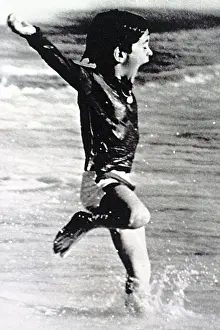 Beach Prints: JOHN F. KENNEDY Jr. on a beach in Antigua