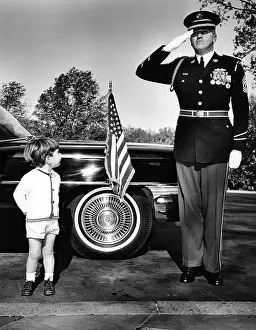 Limousine Prints: John F. Kennedy Jr. look up at Sgt