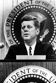 Speaking Prints: John F. Kennedy, tells a news conference that he has been informed that Soviet jet bombers will be removed from Cuba