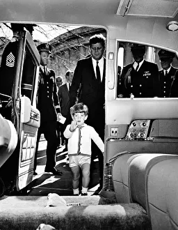 Toys Prints: John Kennedy Jr. enters the Presidential Limousine as his father