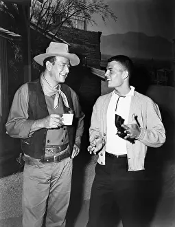Patrick Prints: John Wayne, and his son, Pat Wayne, circa 1950s. Courtesy: CSU Archives/Everett Collection
