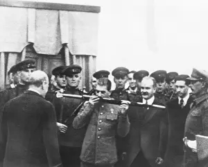 Molotov Prints: Josef Stalin kisses sword given by British in honor of the citizens of Stalingrad