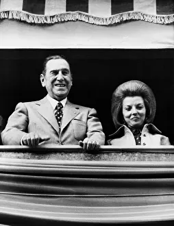 Juan Prints: Juan Peron, 77, watches a parade with his wife, Isabel, 40, in Buenos Aires, Aug. 31, 1973