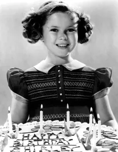 Birthday Prints: JUST AROUND THE CORNER, Shirley Temple with her birthday cake
