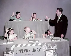 Host Prints: JUVENILE JURY, host Jack Barry (right) with child panelists