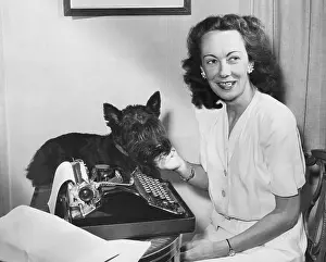 Secretary Prints: Kay Summersby, attaching an American flag to General Dwight Eisenhower's car