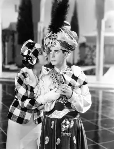 Plaid Jacket Prints: KID MILLIONS, from left: Ethel Merman, Eddie Cantor, 1934