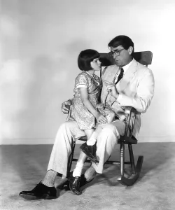 Sitting In Chair Prints: TO KILL A MOCKINGBIRD, Mary Badham, Gregory Peck, 1962