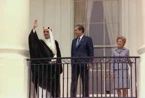Bisht Prints: King Faisal of Saudi Arabia waves from the White House balcony after his welcome from President and Pat Nixon