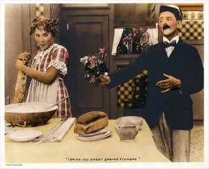 Phil Prints: BACK TO THE KITCHEN, from left: Louise Fazenda, Phil Dunham on a lobbycard, 1919