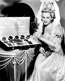 Hand Mirror Prints: KITTY, Paulette Goddard with $25, 000 toilet set she will be using in the film, 1945