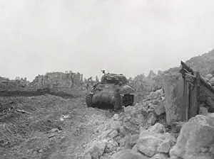 Allies Prints: Knocked out Sherman tank in the shattered remains of Cassino a month after the historic bombing