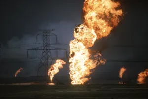 Darkness Prints: Kuwaiti oil wells set on fire by retreating Iraqi forces during Operation Desert Storm darken the sky with smoke