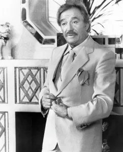 Homosexual Prints: LA CAGE AUX FOLLES II, Ugo Tognazzi, 1980. United Artists/courtesy Everett Collection