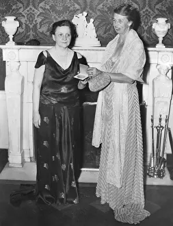 Awards Prints: Labor Sec. Frances Perkins receiving a gold medal from Mrs