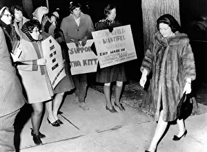 Lady Bird Prints: Lady Bird Johnson walks past a group of youthful anti-war demonstrators