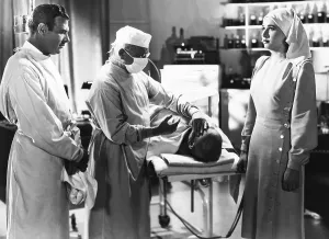 Surgical Gown Prints: THE LADY AND THE MONSTER, from left: Richard Arlen, Erich von Stroheim, Vera Ralston, 1944