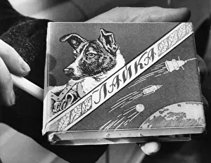Smoking Book Prints: Laika the Russian space dog, first creature to orbit the earth has a brand of cigarettes named for him