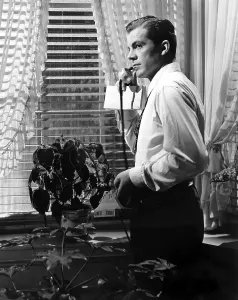 Talking On Phone Prints: LAURA, Dana Andrews, 1944. TM and Copyright 20th Century Fox Film Corp