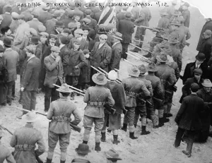 1910s Candid Prints: Lawrence Textile Strike. Massachusetts militiamen with fixed bayonets surround a parade of strikers