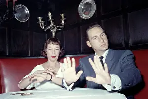 Celebrities Prints: From left: Imogene Coca, Sid Caesar, sitting at banquette, ca. 1950s