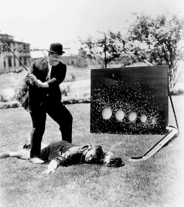 Golf Club Prints: From left, Oliver Hardy, Stan Laurel, brushing up on their golf game, ca. 1930s
