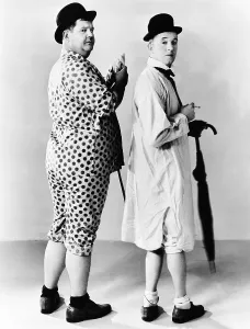 From left: Oliver Hardy, Stan Laurel, Hal Roach publicity shot, early 1930s