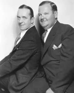 Suit And Tie Prints: From left: Stan Laurel, Oliver Hardy, MGM publicity shot, 1930s