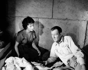 Dungeon Prints: LEGEND OF THE LOST, from left, Sophia Loren, John Wayne, 1957