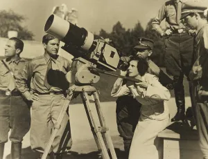 Actresses Prints: Leni Riefenstahl looking through a large camera with Cinematographer Sepp Allgeier