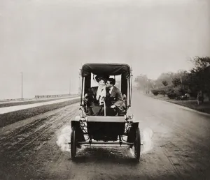 2010 17 Prints: HE LETS HER STEER WHILE HE GETS HER EAR