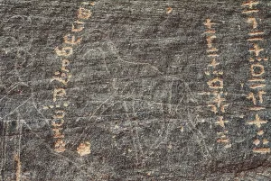 Neolithic Prints: LIBYA. Tadrart Acacus. Rupestrian carving with reprsentation of a zoomorphic figure and inscriptions (12)