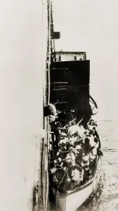 Deaths Prints: Lifeboat from Titanic is lifted aboard the rescue vessel Carpathia. April 15, 1912